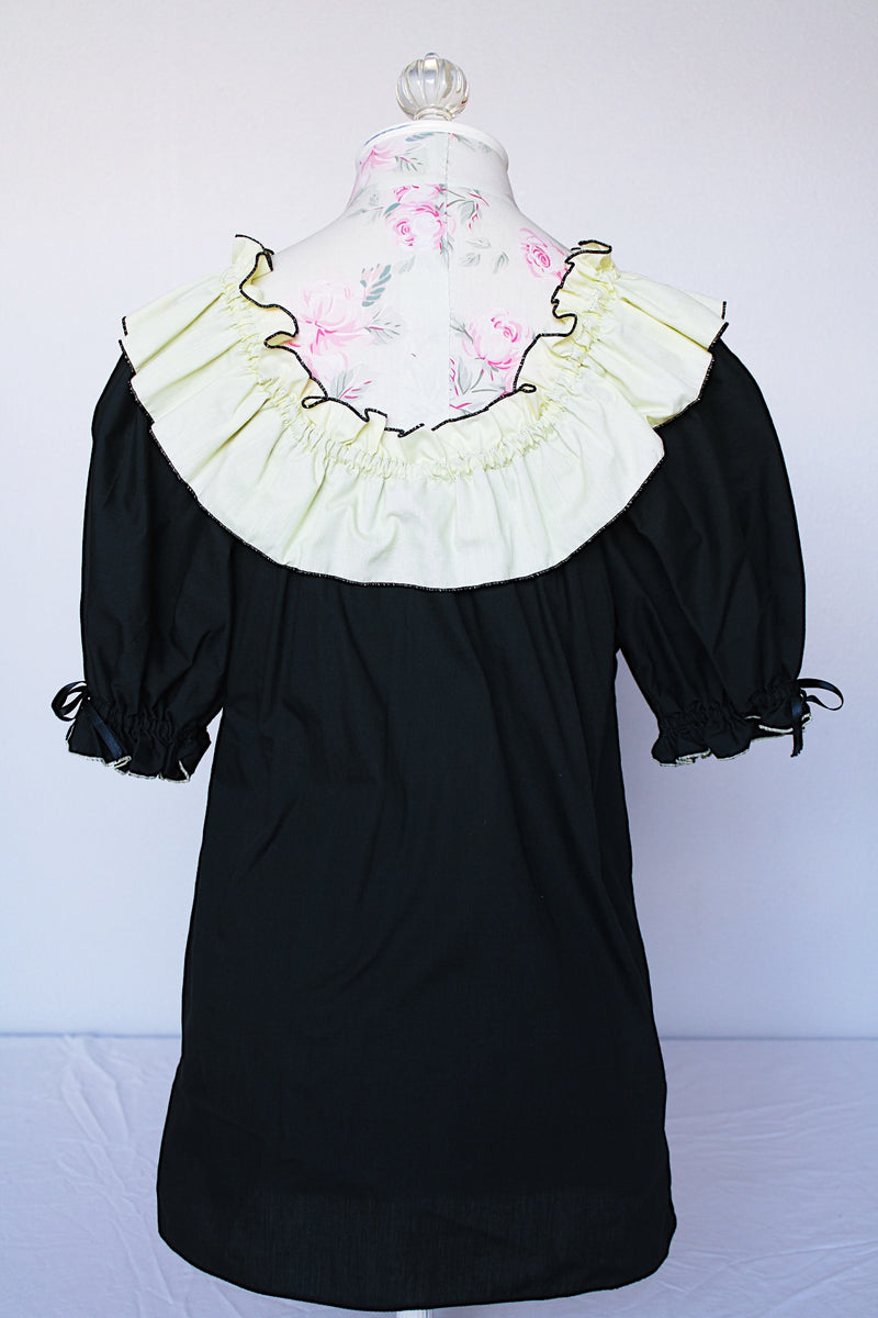 Women's vintage 1970's SaSabobs label two piece top and skirt set square dance costume in black and white.