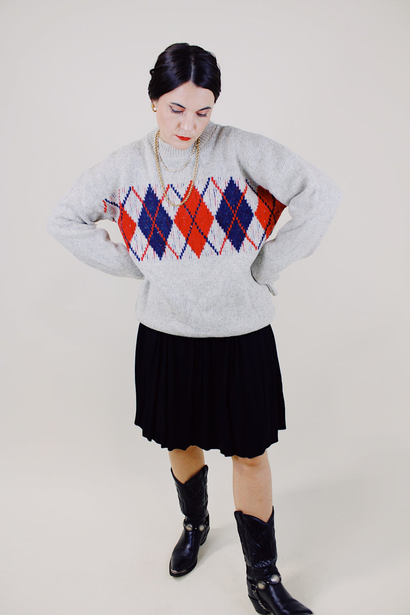 long sleeve grey pullover wool sweater with navy and red argyle print