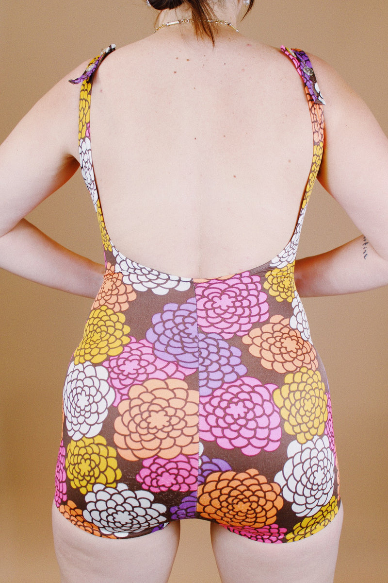 vintage 1970's floral printed one piece swimsuit with wrap bust and skirt front