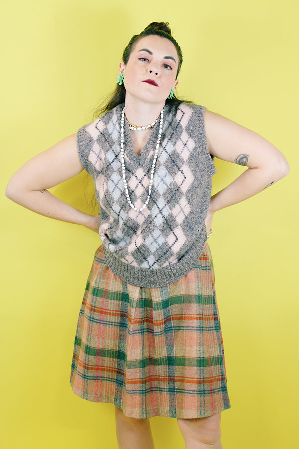Women's vintage 1970's Pretty Plus label plaid print knee length pencil skirt with elastic waistband in a wool blend material.