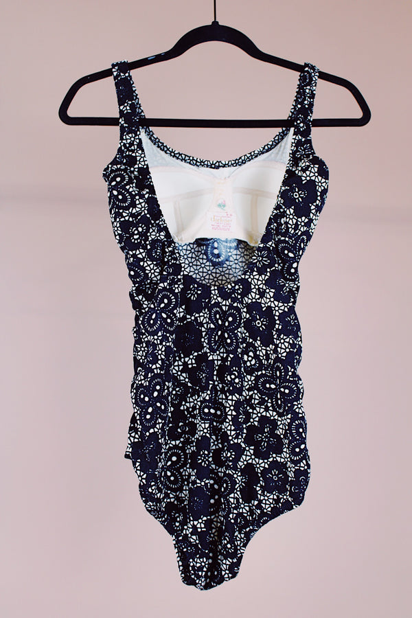 black and white vintage 1960's one piece swimsuit in a lace looking print