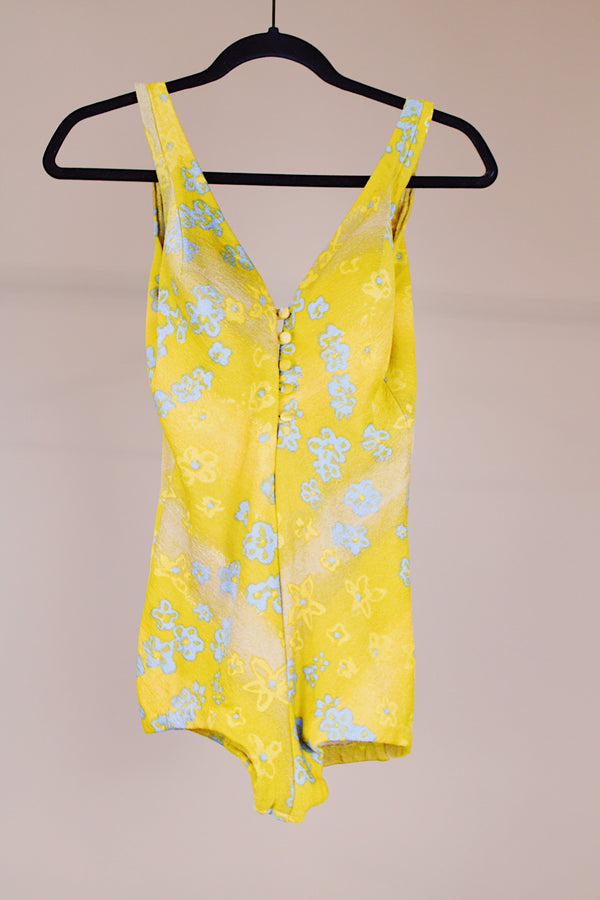 one piece vintage 1950's swimsuit in yellow with grey floral print