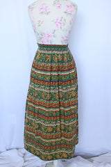 Women 's vintage 1970's cotton lightweight ankle length maxi skirt in all over green and brown abstract print. 