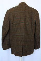 Women's or men's vintage 1970's The Men's Store, Carson Pirie Scotte Co. label long sleeve button up wool blazer in forest green plaid print.