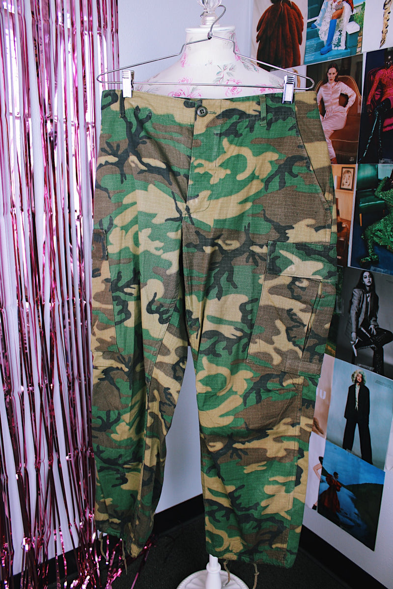 green camo print us military pants with pockets and adjustable waist and ankles vintage 