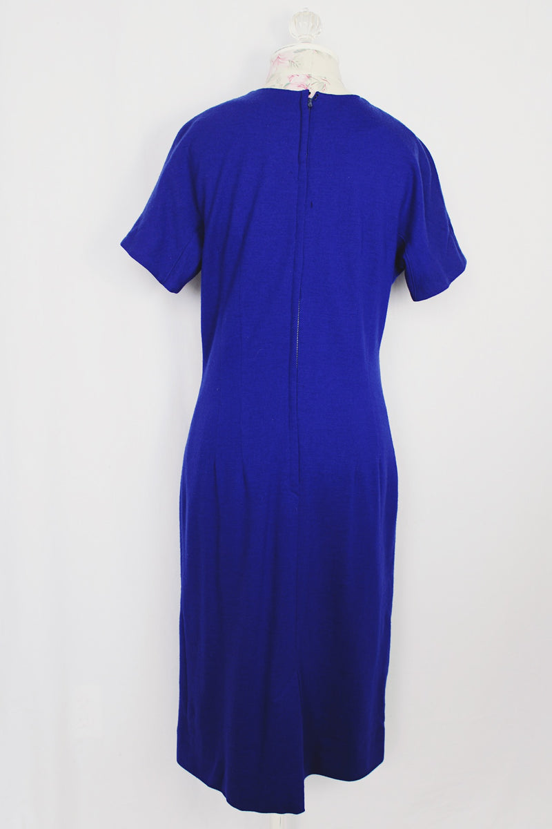 Women's vintage 1960's Elaine Terry California label short sleeve cobalt blue wool midi length dress.