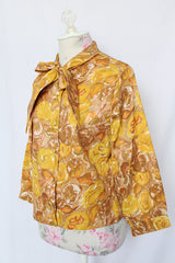 Women's vintage 1960's Diane Young label 3/4 arm length button up blouse in yellow and brown all over floral print