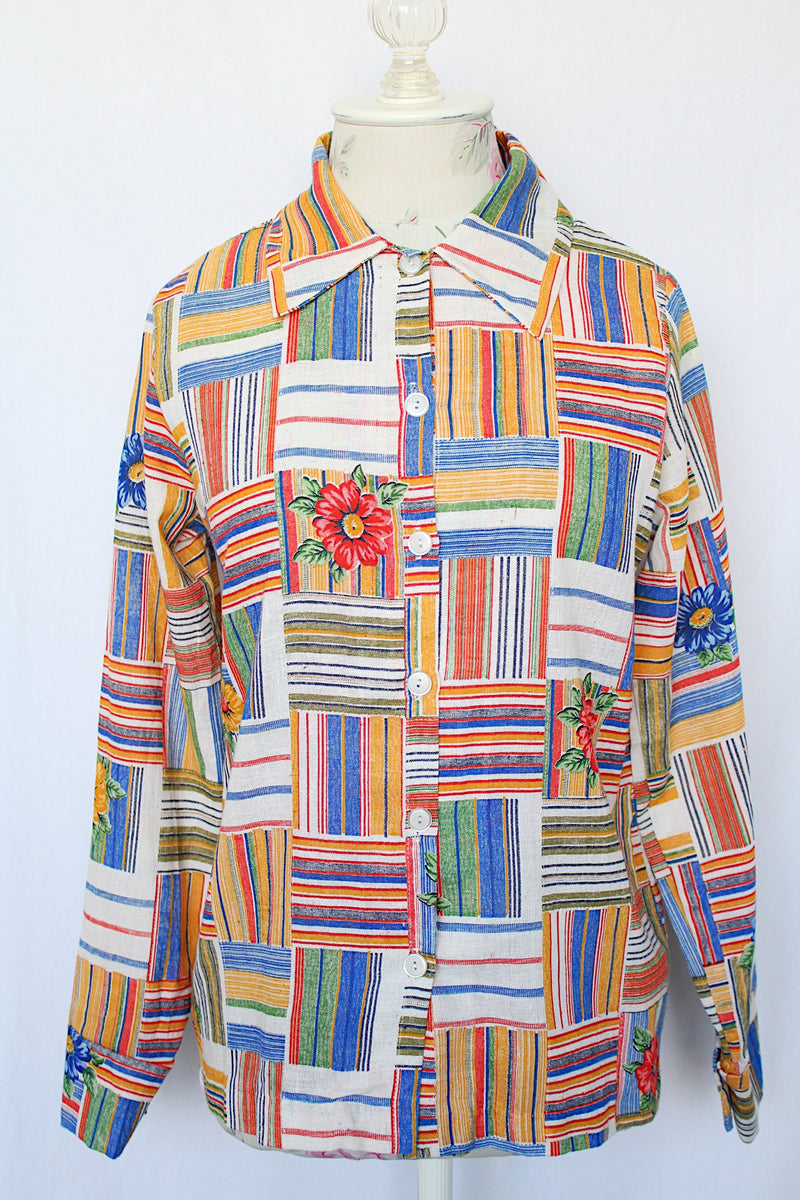 Women's vintage 1970's Montgomery Ward label long sleeve button up blouse with collar.