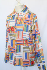 Women's vintage 1970's Montgomery Ward label long sleeve button up blouse with collar.