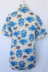 Women's vintage 1970's Montgomery Ward short sleeve button up printed blouse collared blouse. Cream with all over blue print. 