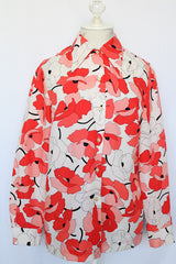 Women's vintage 1970's Sears Fashions label long sleeve button up blouse with pointy collar and darted bust. Polyester material in white with all over red and pink poppy floral print. 
