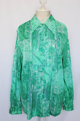 Women's vintage 1970's Mr. Alex a division of Alex Colman label long sleeve button up blouse with pointy collar in nylon material.