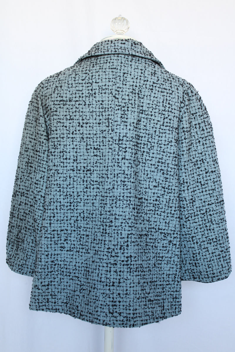 Women's vintage 1940's Bedell, An Original by Solmar - The Finest Name in Fashion label short sleeve wool cropped jacket with one button closure. Has small rounded collar, big clear button, blue colored. 