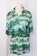 Women's or men's vintage 1970's Innovation by National Shirt Shops short sleeve button up shirt with collar in all over green and blue print in slinky polyester material.