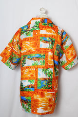 Men's or women's vintage 1970's Mauna Kea label short sleeve button up shirt with double lapel, left chest pocket, and amber buttons in orange all over Hawaiian print. 