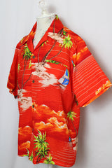 Women's or men's vintage 1970's Made in Hawaii short sleeve red all over Hawaiian print button up shirt. 