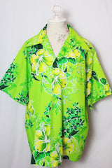 Men's or women's vintage 1970's Reef, Made in Hawaii label shirt sleeve button up shirt in all over bright green Hawaiian print.