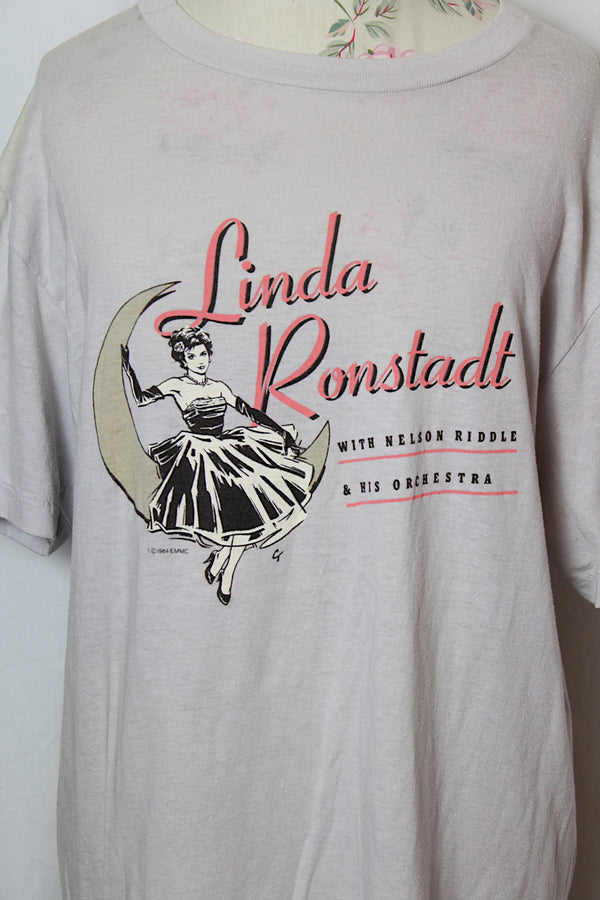 Women's vintage 1984 Ched, Quality Knits By Anvil, Made in USA label short sleeve light grey colored graphic band tee by Linda Ronstadt.