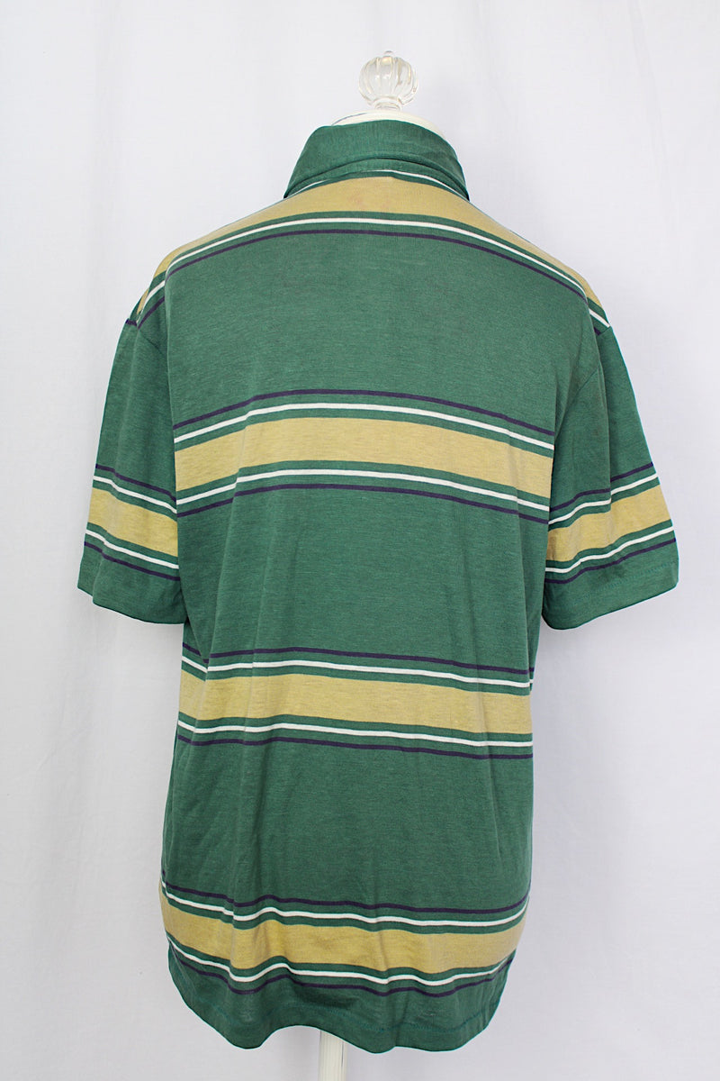 Women's or men's vintage 1980's Munsingwear, Made in USA label short sleeve green striped polo t-shirt with collar and half button closure. Polyester cotton blend. 