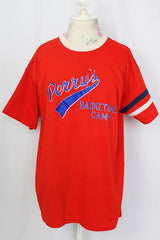 Women's vintage 1970's Champion label short sleeve red t-shirt with test on the front and navy and white trim. 