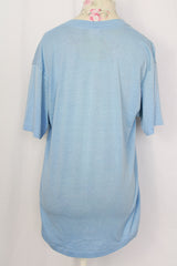 Women's or men's vintage 1980's Stanfield's label short sleeve light blue graphic t-shirt. Polyester cotton blend material.