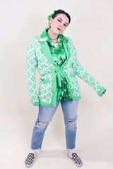 Women's vintage 1970's lime green and white printed open long cardigan with matching detachable tie belt.