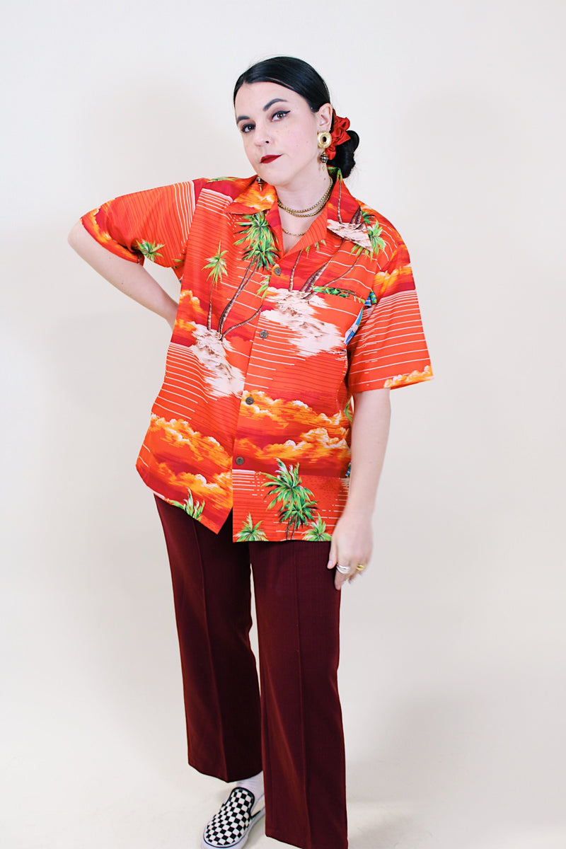 Women's or men's vintage 1970's Made in Hawaii short sleeve red all over Hawaiian print button up shirt. 