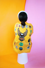 long sleeve yellow nylon windbreaker with patches all over vintage 1960's