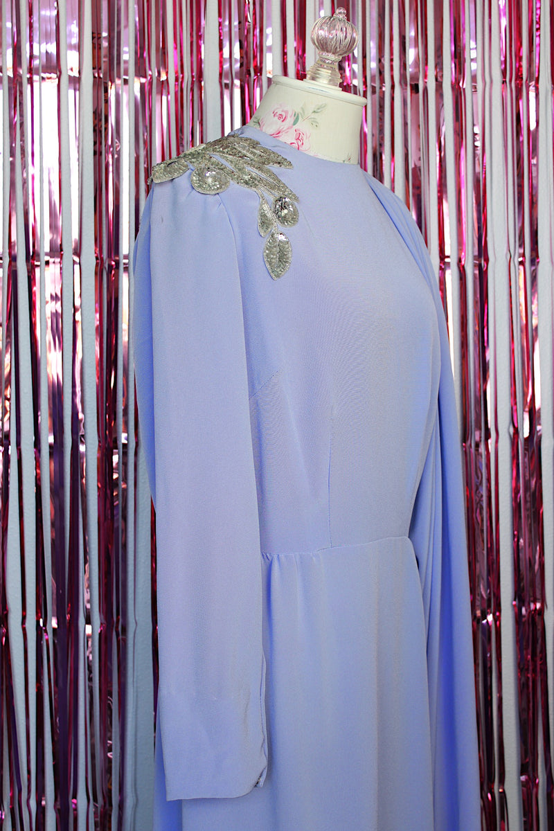 long sleeve purple midi length dress with one sequined shoulder and one shoulder with attached cape vintage 1980's
