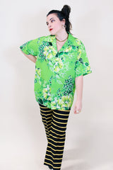 Men's or women's vintage 1970's Reef, Made in Hawaii label shirt sleeve button up shirt in all over bright green Hawaiian print.