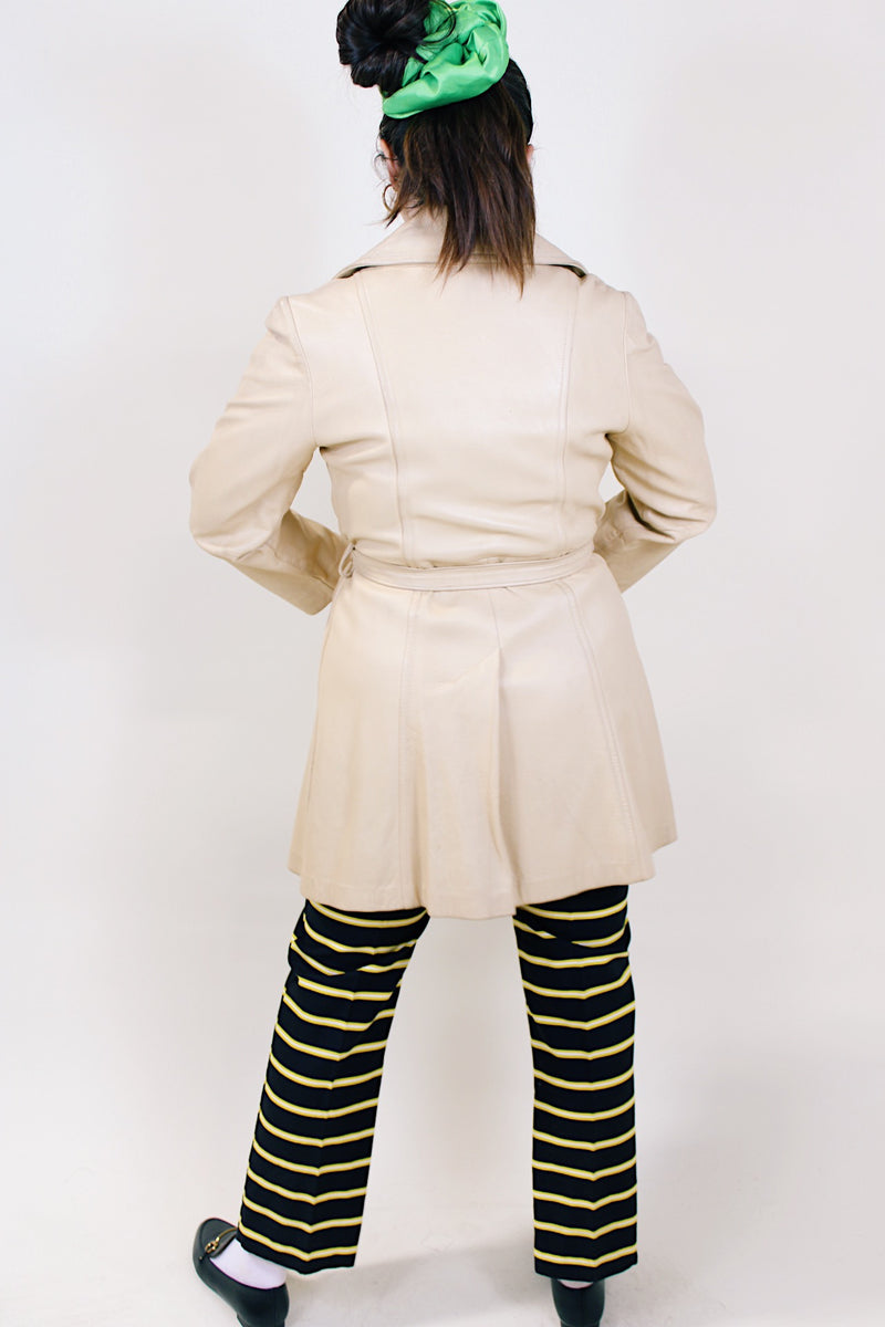 Women's vintage 1970's New England Sportswear Company cream colored leather long length long sleeve wrap coat.