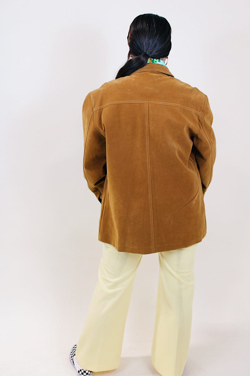 Men's vintage 1970's Pacific Trail Sportswear label long sleeve light brown colored PVC suede button up jacket with dagger collar.