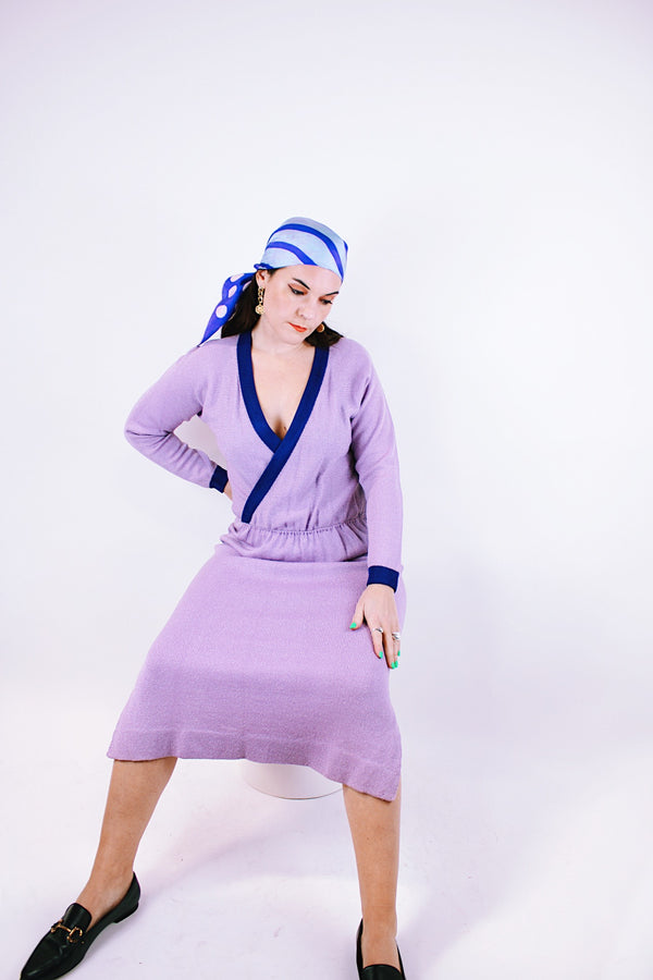 vintage 1980's midi length long sleeve wool knit dress with deep v neck in purple with darker purple trim