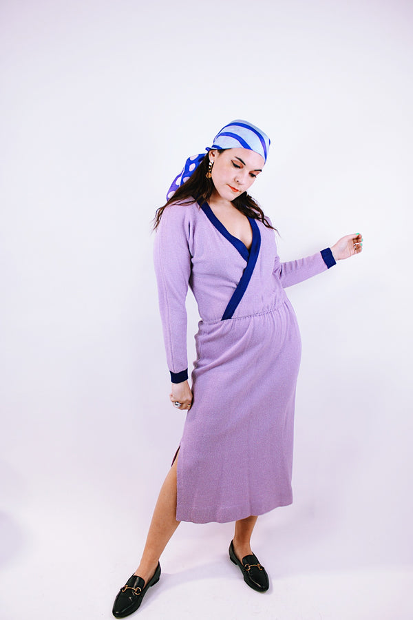 vintage 1980's midi length long sleeve wool knit dress with deep v neck in purple with darker purple trim