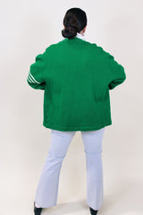 Men's or women's vintage 1980's Skookum Letterman label long sleeve bright green button up cardigan in wool material.