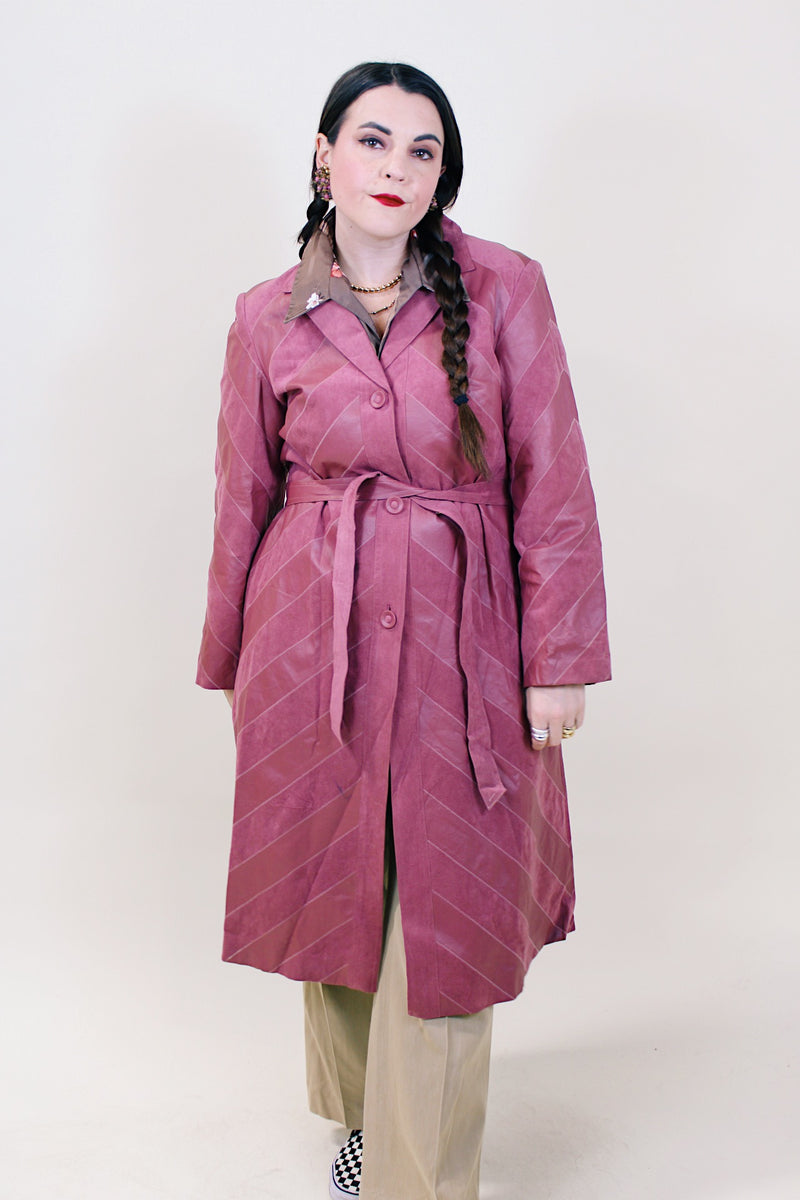 Women's vintage 1970's long sleeve long length mauve pink colored leather and suede lightweight button up jacket.