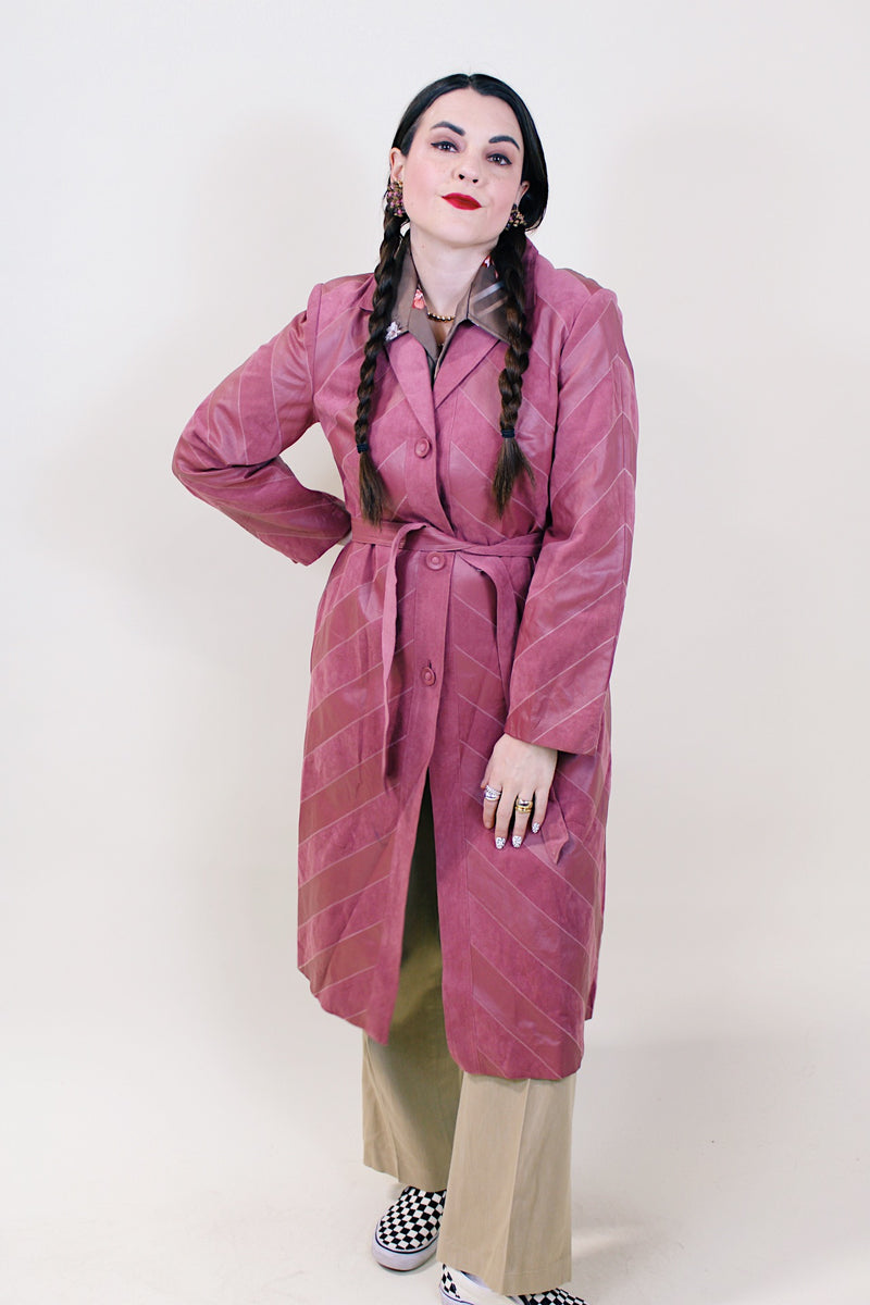Women's vintage 1970's long sleeve long length mauve pink colored leather and suede lightweight button up jacket.