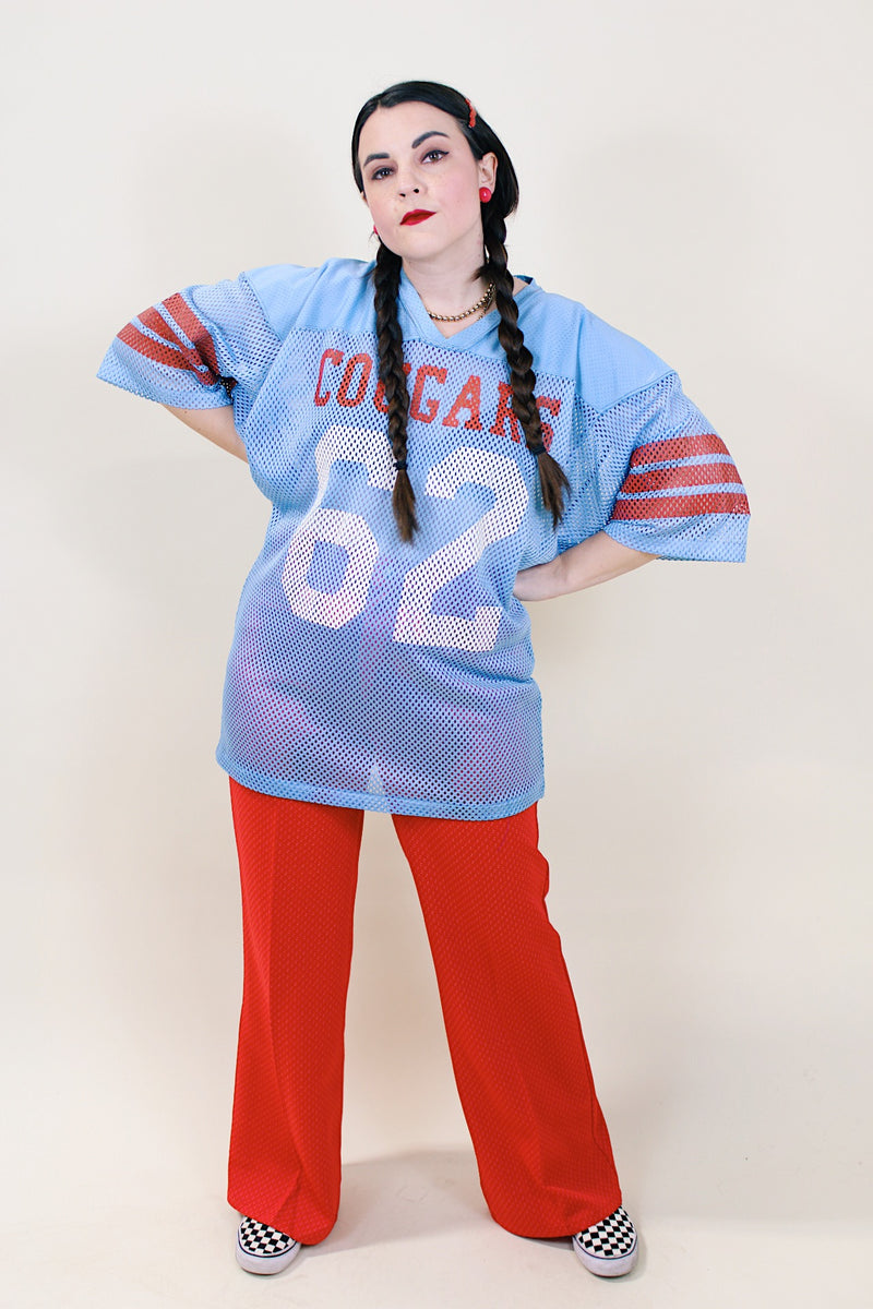 Women's or men's vintage 1980's Fab Knit, Made in USA label short sleeve long length blue, white, and red mesh nylon sports jersey.