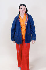 Women's vintage 1980's denim cotton long sleeve jacket with popper buttons up the front and two front pockets.