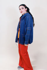 Women's vintage 1980's denim cotton long sleeve jacket with popper buttons up the front and two front pockets.