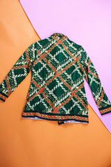long sleeve cotton zip up blouse in green with yellow and orange print vintage women's 1960's