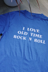 short sleeve cobalt blue vintage tee with the text i love old time rock n roll