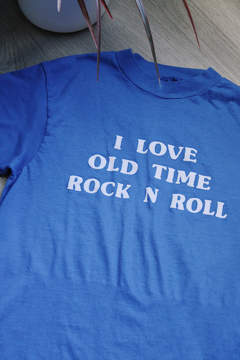 short sleeve cobalt blue vintage tee with the text i love old time rock n roll