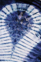 purple and navy tie dye short sleeve t-shirt with skull and skeleton graphics on the front and back 1990's