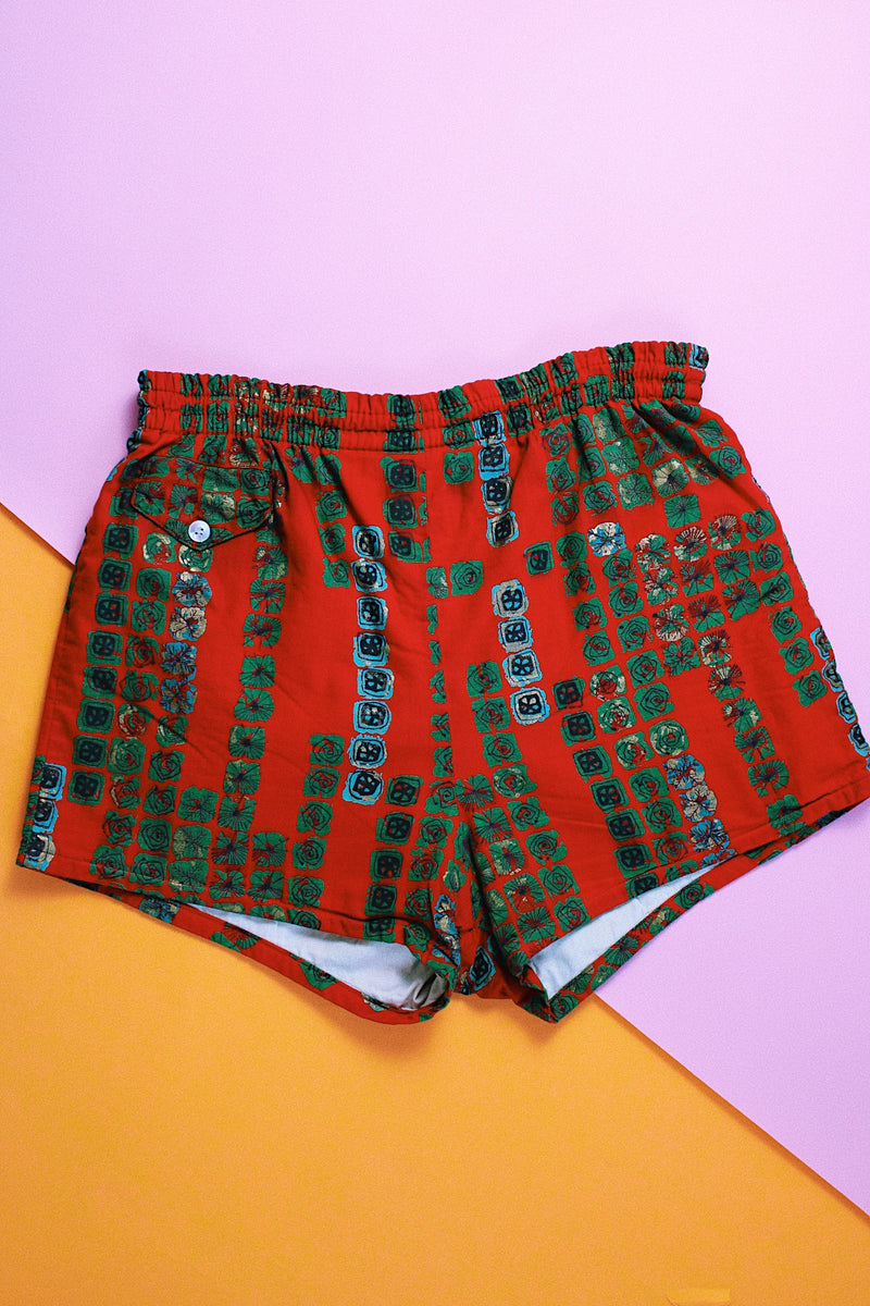 red printed 1960's men's vintage swim trunk shorts in cotton material 