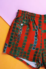 red printed 1960's men's vintage swim trunk shorts in cotton material 