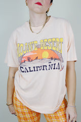 Short sleeve peach colored cotton graphic tee vintage 1990's