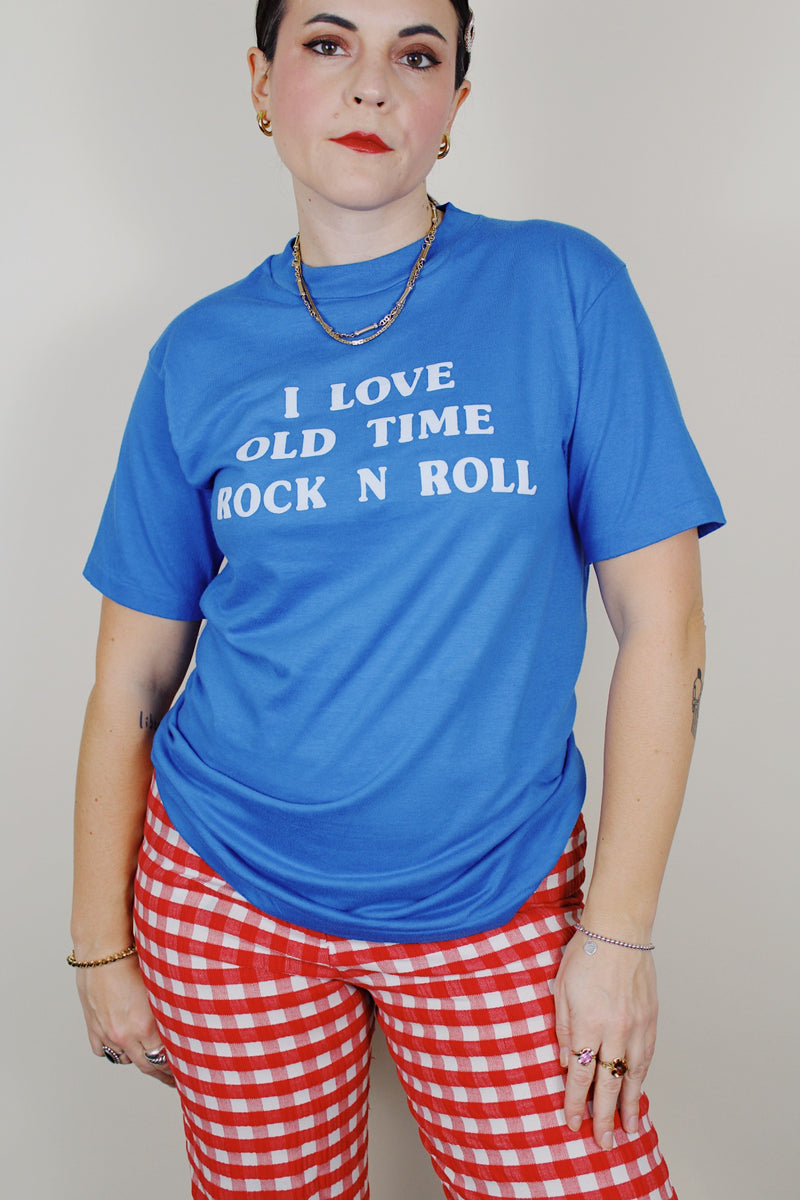 short sleeve cobalt blue vintage tee with the text i love old time rock n roll