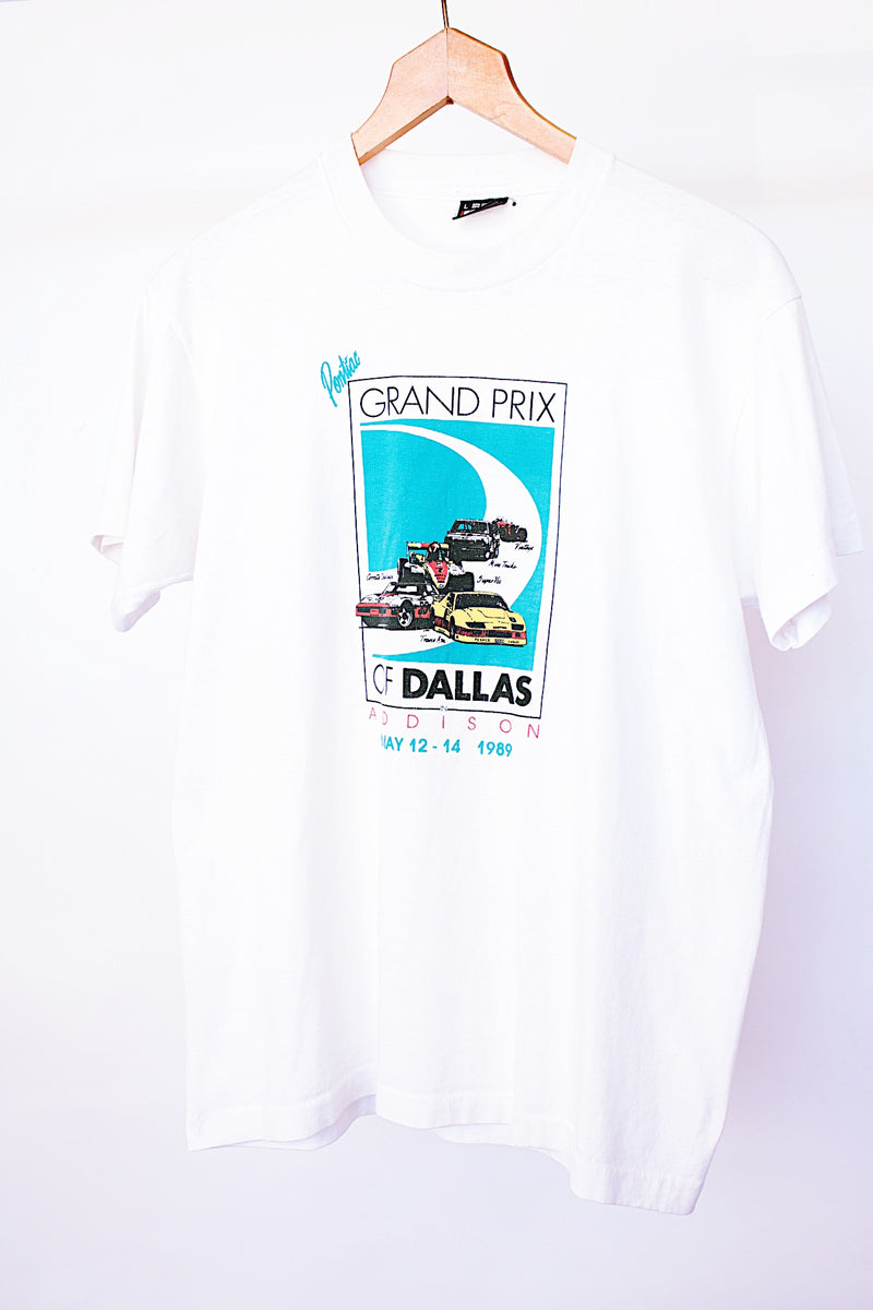 short sleeve white vintage 1989 t-shirt with grand prix of dallas race car graphic on front