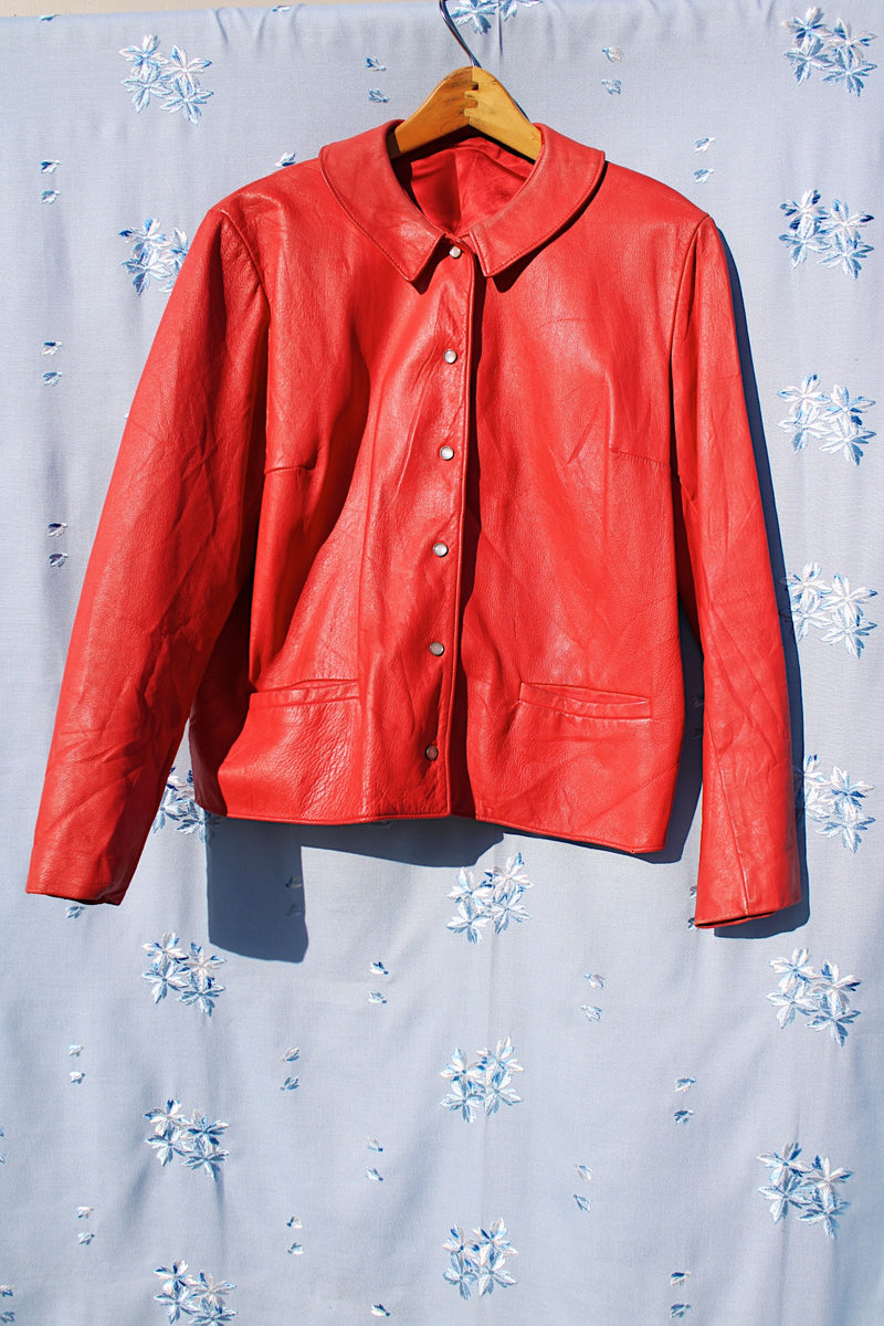 long sleeve red leather jacket with popper buttons and peter pan collar vintage 1970's 